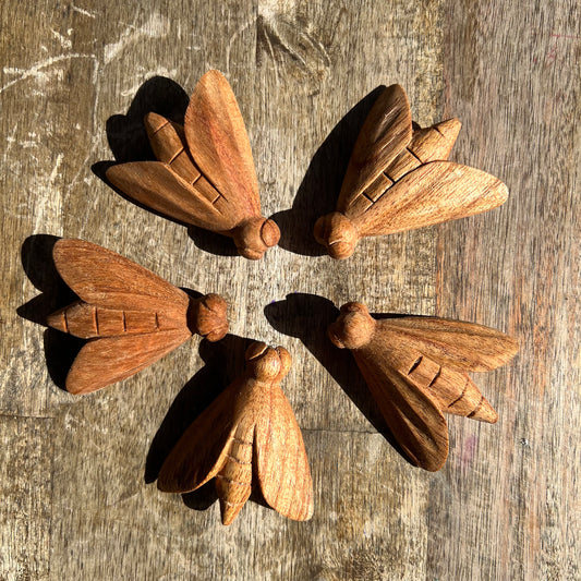 Wood carved bees